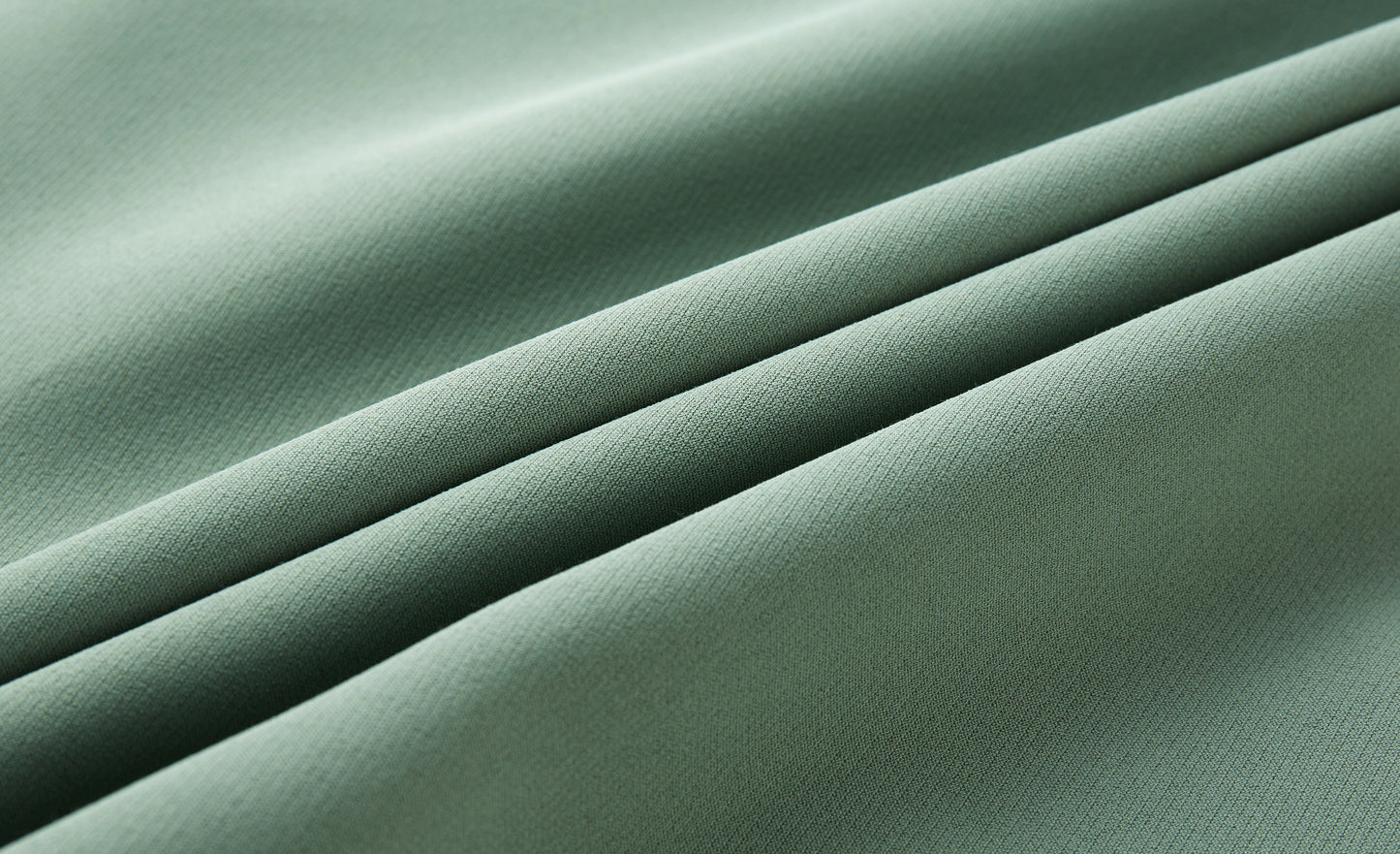 Celadon sleeveless suit with cutaway buttons