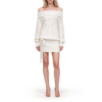 A white hollowed-out sweater