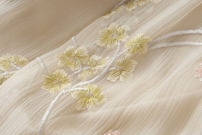 Yellow embroidered halter dress