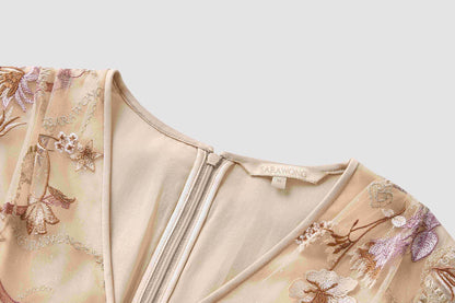 Embroidered floral dress with a large display