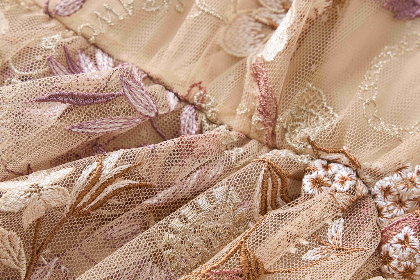Embroidered floral dress with a large display