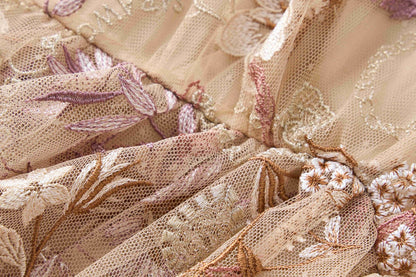 Embroidered floral dress with a large display