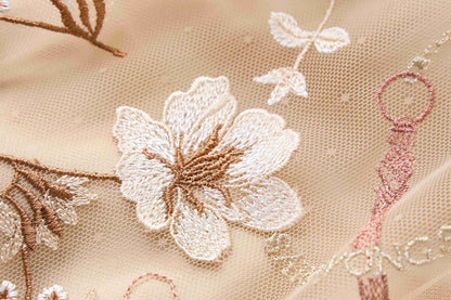 Embroidered floral dress with a large display