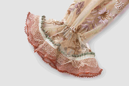 Embroidered floral dress with a large display