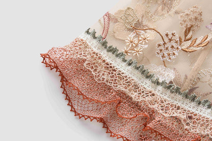 Embroidered floral dress with a large display