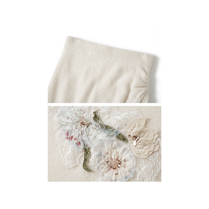 A beige embroidered woolen top