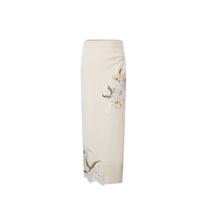 A beige embroidered woolen skirt