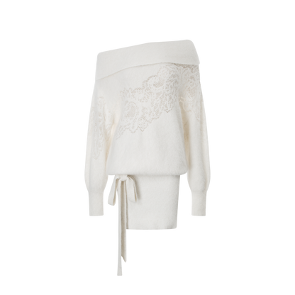A white hollowed-out sweater