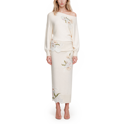 A beige embroidered woolen top
