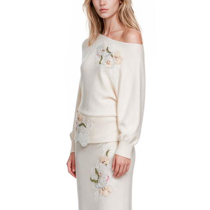 A beige embroidered woolen top